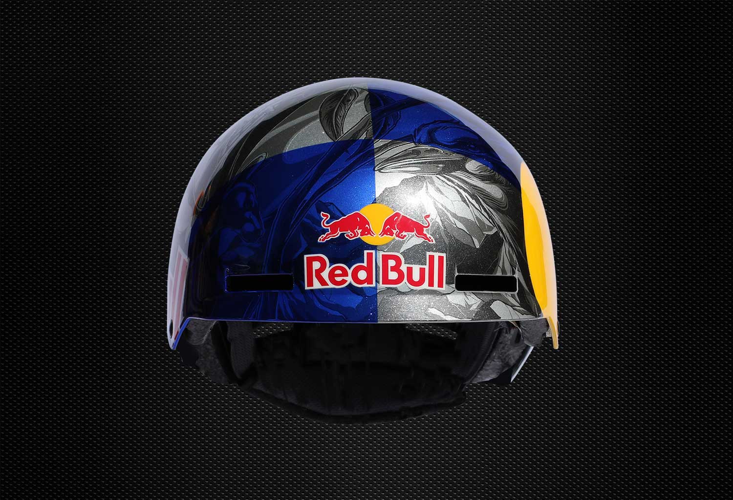 Red Bull helmet graphic, front view, Russ Henshaw Front view of a Red Bull helmet with blue and silver custom graphic artwork and Red Bull logo centred on a black textured background.